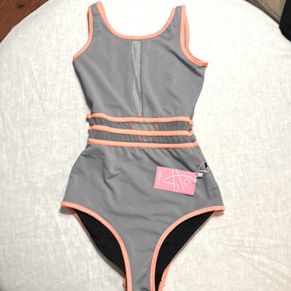 Grey and melon Daroch NWT leotard in AXS.
